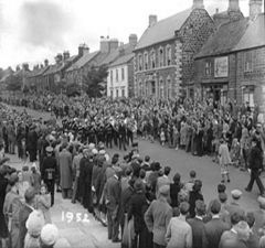 brass band marching through Bedlington Front Street. 1952.JPG