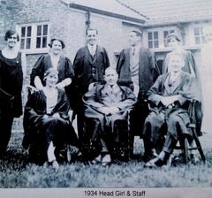 1934 Head girl and staff.jpg